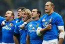 Sergio Parisse leads his players in a spirited rendition of the Italian national anthem