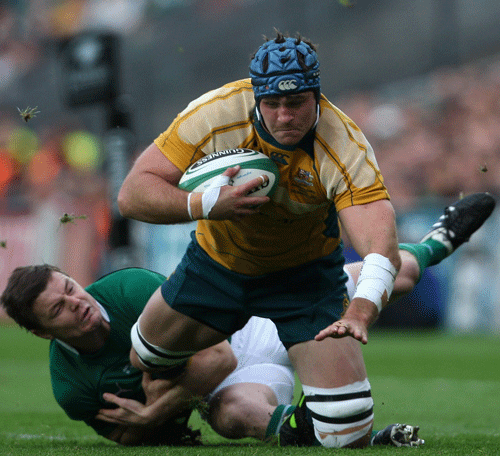 Brian O'Driscoll gets to grips with James Horwill