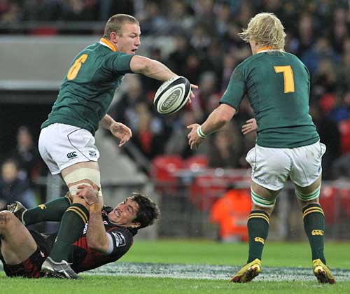 South Africa's Jean Deysel offloads the ball