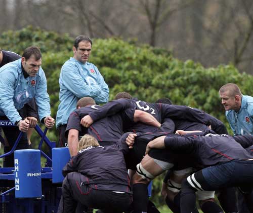 England coaches John Wells, Martin Johnson and Graham Rowntree oversee scrummaging practice