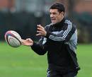New Zealand fly-half Dan Carter passes the ball in training