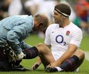 England flanker Joe Worsley receives treatment after an early knock