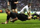 New Zealand scrum-half Jimmy Cowan crosses for the game's only try