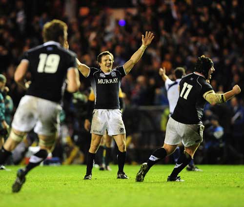 Scotland scrum-half Rory Lawson celebrates at the final whistle