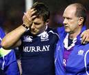 Scotland skipper Chris Cusiter is helped from the field with a head knock