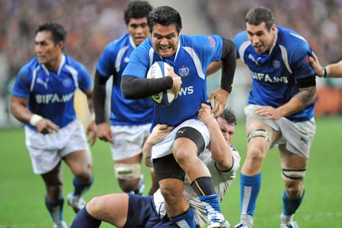 Samoa's Andrew Williams breaches the France defence