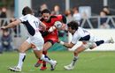Toulouse fullback Clement Poitrenaud avoids a tackle