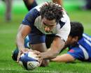 France's Benjamin Falls scores a try