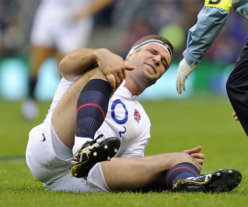 England flanker Joe Worsely reacts to a knee injury