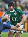 Ireland's Denis Leamy takes on the France defence