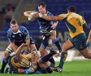 Blues scrum-half Gareth Cooper takes the attack to Australia