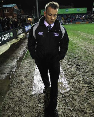 Sale coach Kingsley Jones walks from the pitch at Edgeley Park after their game wit Wasps was postponed, Sale v Wasps, Guinness Premiership, Edgeley Park, November 27, 2009