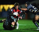 Saracens wing Chris Wyles is tackled by the Worcester defence