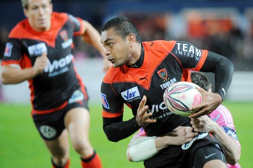 Toulon centre Mafileo Kefu is tackled by Laurent Sempere
