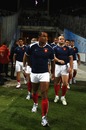 France captain Thierry Dusautoir leads his players out for a team photo
