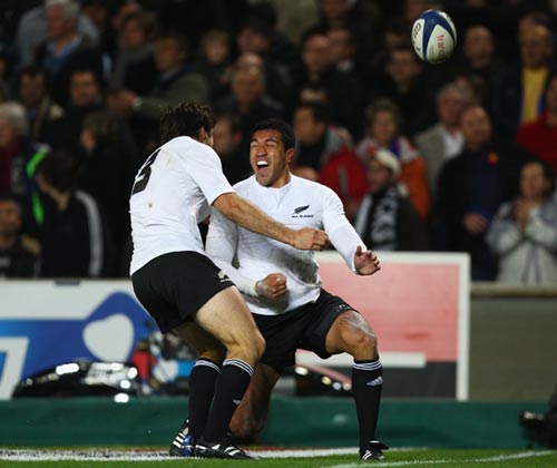 Mils Muliaina celebrates after touching down for the All Blacks