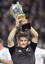 New Zealand's Richie McCaw lifts the Dave Gallaher Trophy