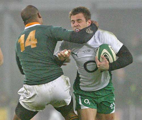 South Africa's JP Pietersen tackles Ireland's Tommy Bowe