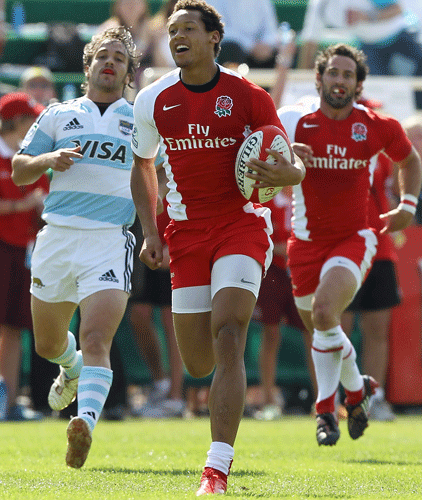 England's Dan Norton gets away from the Argentina defence at the Dubai Sevens
