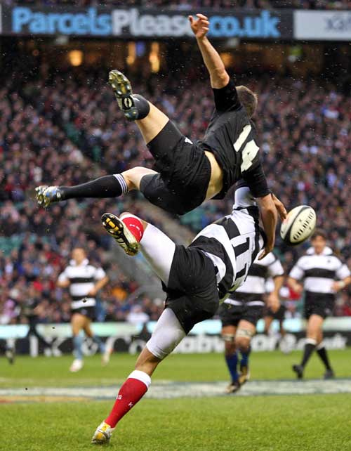 Barbarians winger Bryan Habana and New Zealand counterpart Ben Smith clash in the air