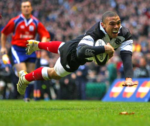 Barbarians winger Bryan Habana dives in to score a try