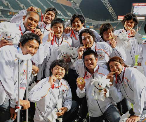 Japan celebrate victory at the 2009 East Asian Games