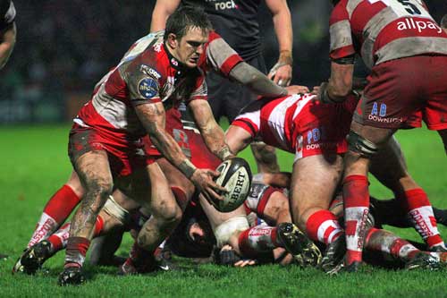 Gloucester scrum-half Rory Lawson looks to clear his lines