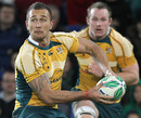 Australia's Quade Cooper passes the ball