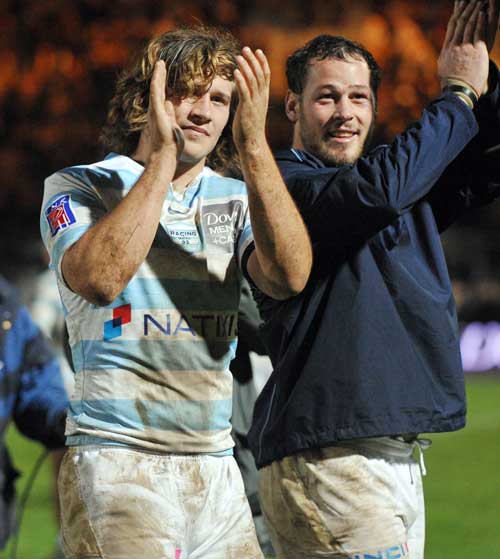 Racing Metro's Frans Steyn and Jacques Cronje salute their supporters