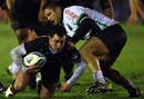 Micky Young is tackled by Julien Audy