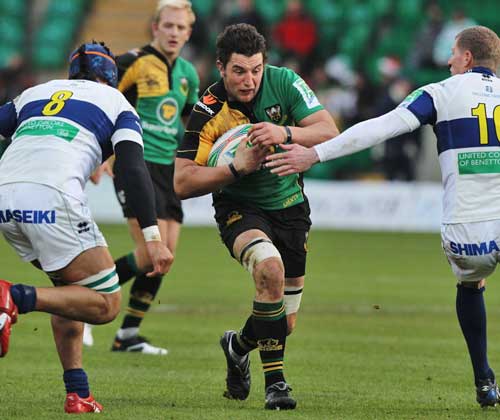 Northampton's Phil Dowson exploits a gap in the Treviso defence