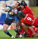 Cardiff Blues scrum-half Gareth Cooper is shackled by the Toulouse defence