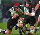London Irish lock Nick Kennedy is hauled down by the Brive defence