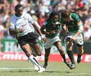 Fiji's Setefano Cakau leaves South Africa's defence in his wake