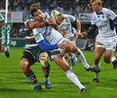 Clermont Auvergne's Julien Malzieu is tackled by Leicester's Anthony Allen