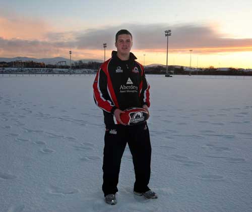 New Edinburgh fly-half Rory Hutton braves the cold at Murrayfield