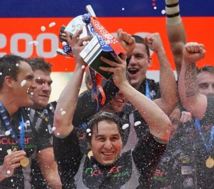 Ospreys captain, Ryan Jones and his team celebrate with the trophy following his team's victory during the EDF Energy Cup Final between Leicester Tigers and the Ospreys at Twickenham in London, England on April 12, 2008.