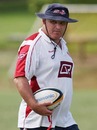 Reds coach Ewen McKenzie casts an eye over a training session