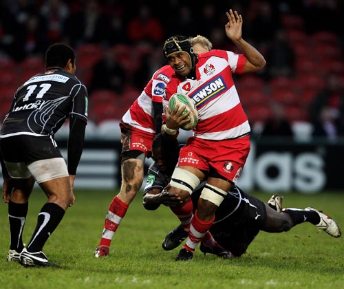 Gloucester's Akapusi Qera tried to evade a tackler