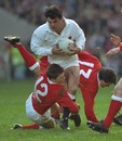 England's Will Carling takes on the Wales defence