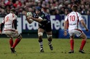 Bath's Danny Grewcock takes on the Ulster defence