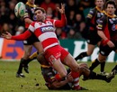 Dragons' Aled Brew forces Nicky Robinson into an offload