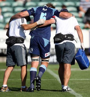 Blues lock Ali Williams hobbles off with an injury, Blues v Chiefs, Super 14 Pre-season match, North Harbour Stadium, Auckland, New Zealand, January 29, 2010