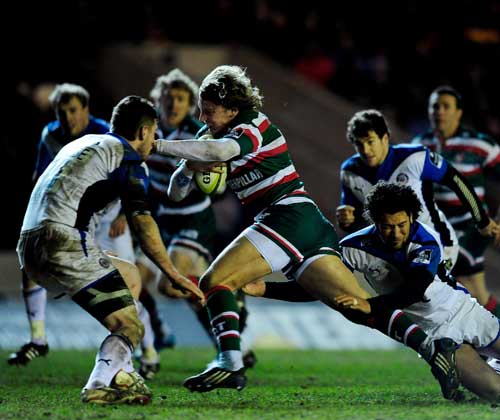 Leicester centre Billy Twelvetrees is caught by the Bath defence