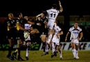 Ospreys wing Shane Williams challenges for a high ball