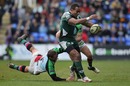 London Irish's Sailosi Tagicakibau is held by the Quins defence
