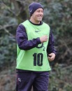 England fly-half Jonny Wilkinson smiles during a training session