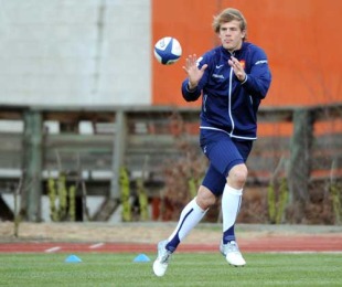France wing Aurelien Rougerie catches the ball during training in Marcoussis, France, February 3, 2010