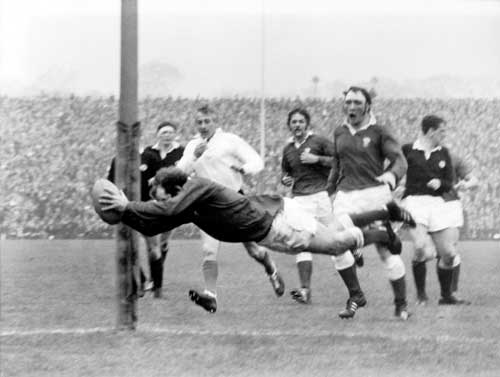 Wales flanker John Taylor dives in to score