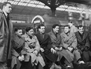 Jack Kyle (third from left) and his Ireland teammates arrive at Dublin Station on their way to face England